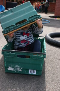 Jalilah plays in the crate 2